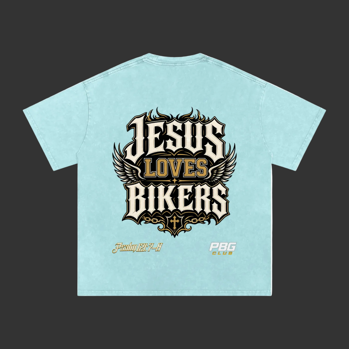 A light blue short-sleeve t-shirt with a large graphic on the back reading 'JESUS LOVES BIKERS' in stylized white, gold, and black lettering with wings. Smaller text below includes 'Fenix25-4' and 'PBG Print'.